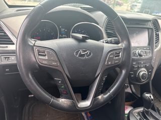 2014 Hyundai Santa Fe Sport 2.0L Turbo - Interior Steering Wheel With Keys Image